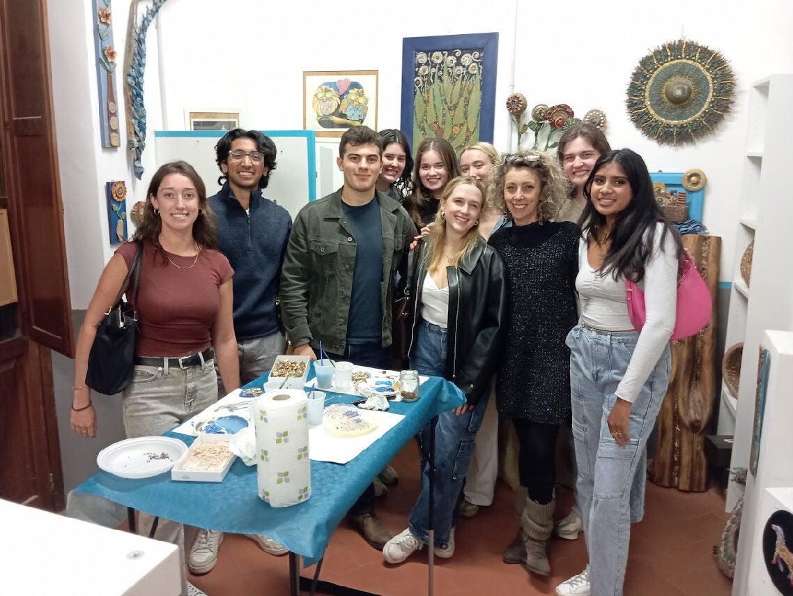 Group photo VLB students and Silvia Logi in Logi's workshop.